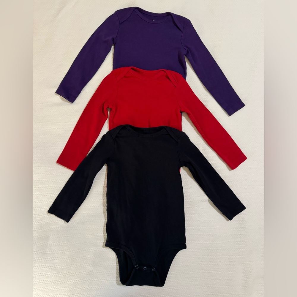 Set of long sleeve onesies by Primary